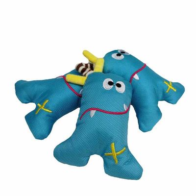 El monstruo de mar resistente del triángulo del azul de Oxford de la mordedura acaricia los juguetes de la felpa